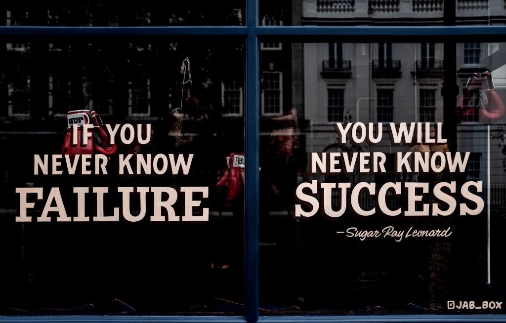 Shop window with the Sugar Ray Leonard quote "If you never known failure, you will never know success."