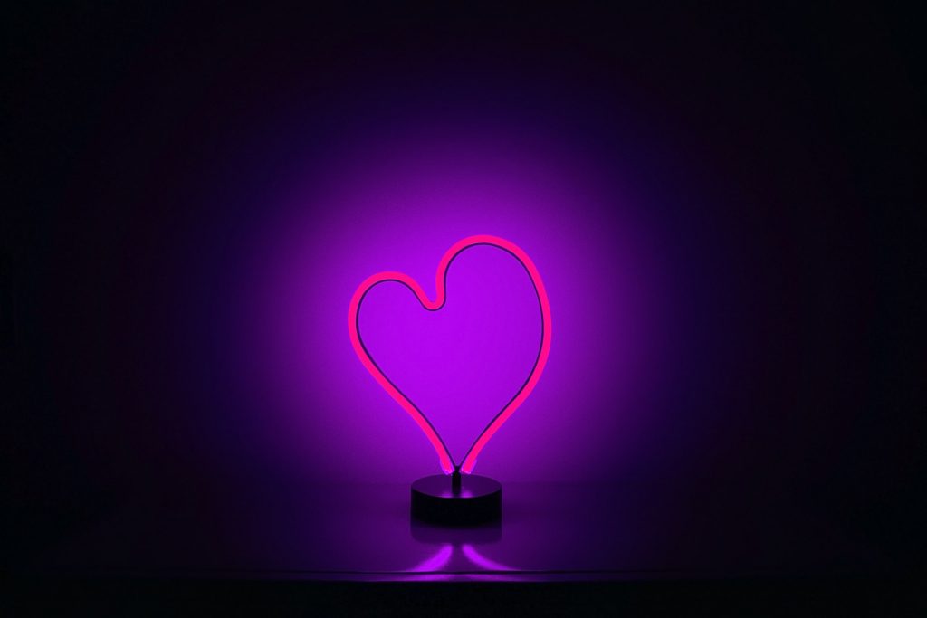 pink neon light in the shape of a heart