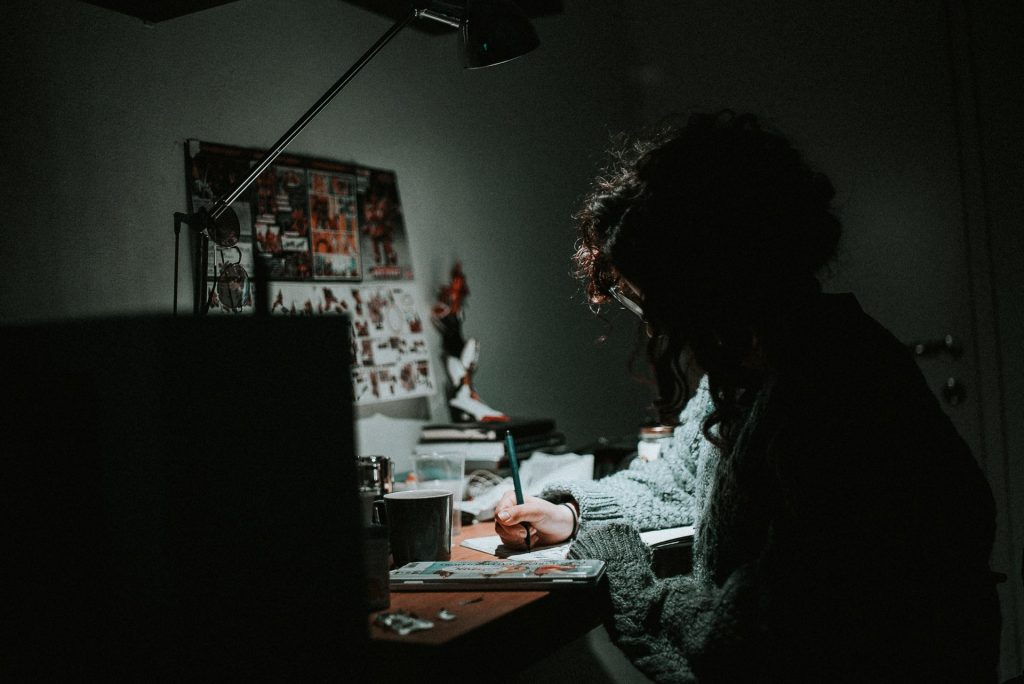 man working at his desk late at night