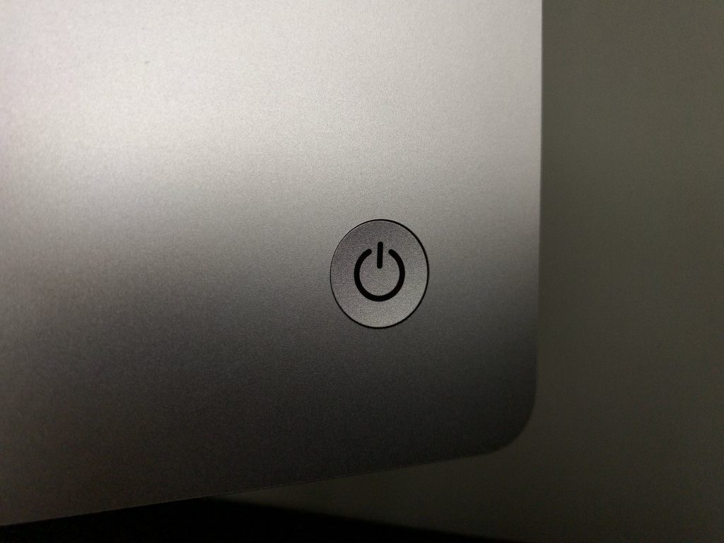 close-up of classic laptop on/off switch